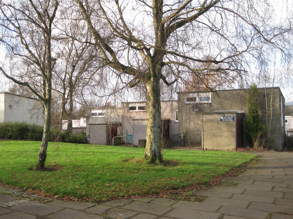 Image of two houses in Cumbernauld with trees in front