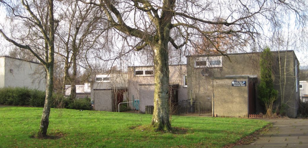 Image of two houses in Cumbernauld with trees in front